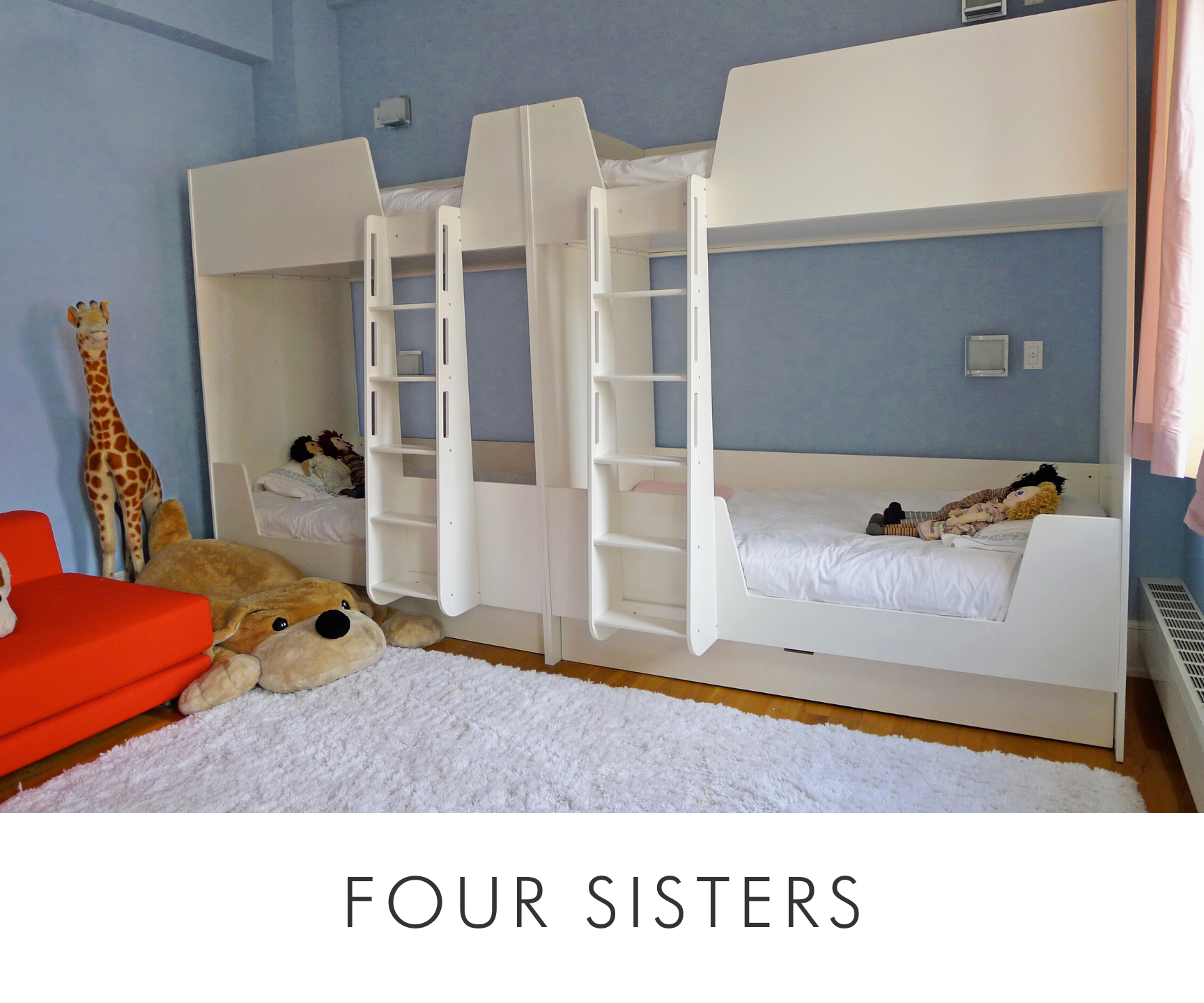 Four sister bright room with four white bunk beds, plush toys, fluffy rug, and a vibrant orange couch.