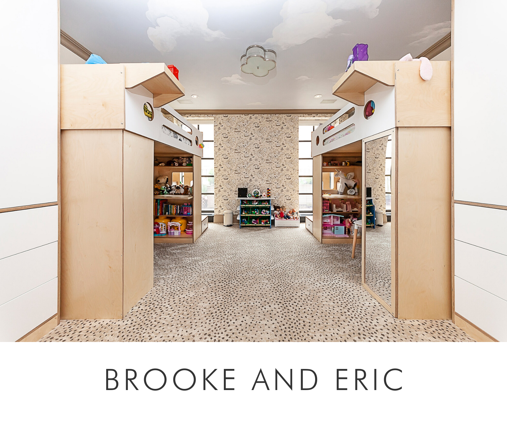 Brooke and eric room spacious play area with two loft entrances, textured carpet, and shelves filled with toys.