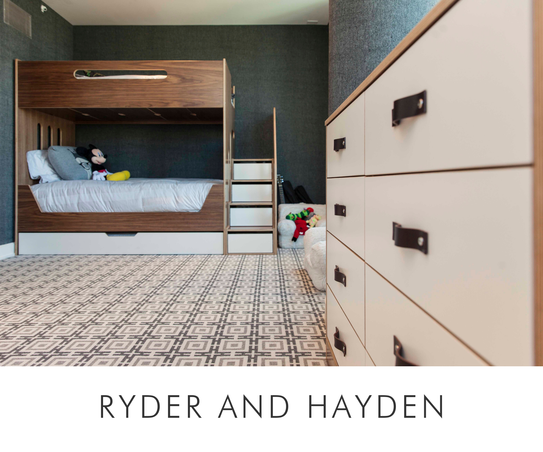 Ryder and hayden modern room with bunk bed, plush toys, patterned carpet, and large white drawers with leather handles.