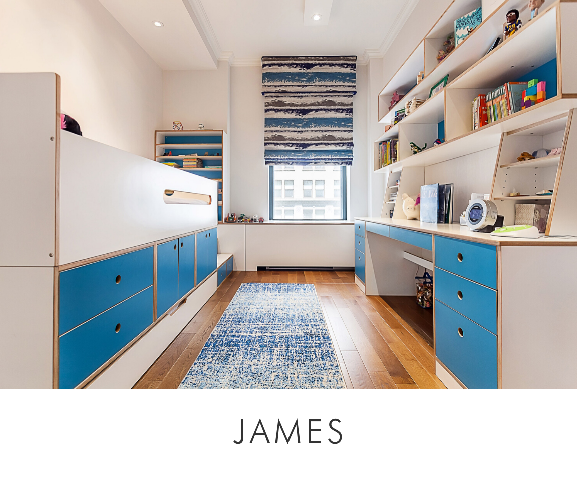 James room stylish child's room with blue cabinets, white shelves, a wooden desk, and a blue rug.