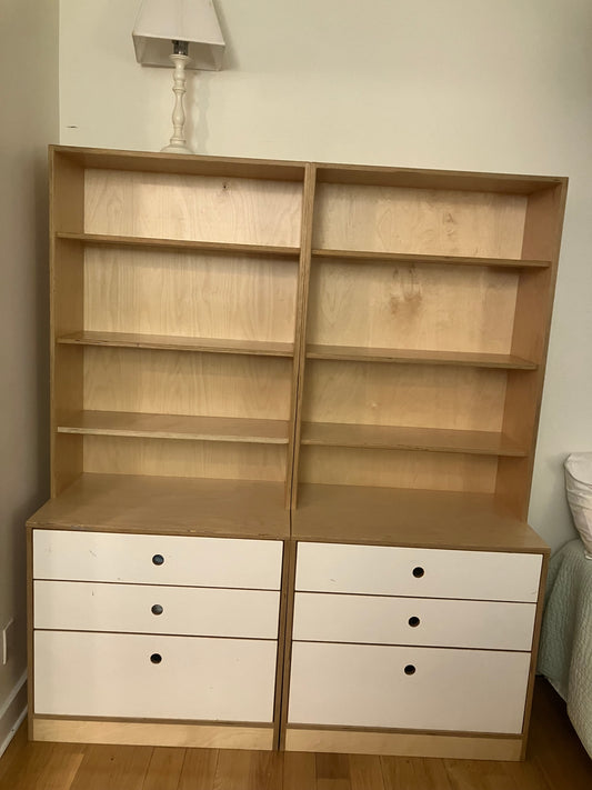 Wooden drawer with compartments and white drawers below