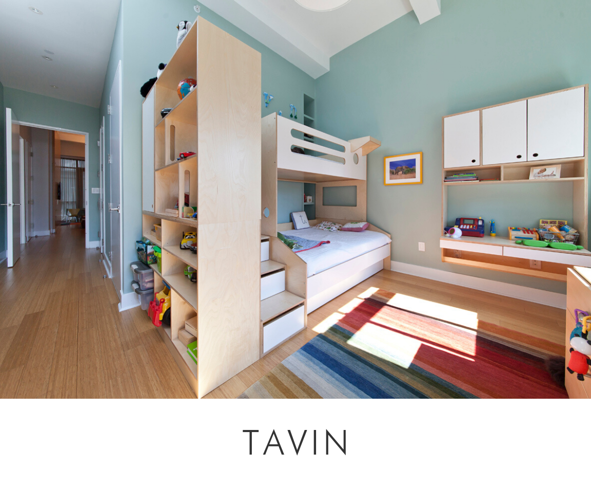 Tavin room bright child's room with a loft bed, built-in shelving, colorful rug, and wooden flooring.