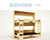 Modular wooden bed frame with Gizmodo Australia logo.