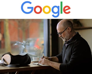 Google logo, person writing, face hidden by brown square.