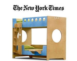 NY Times logo, wooden bunk bed, blue accents, green bedding.