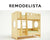 Wooden bunk bed, unique design, circular windows, labeled ‘REMODELISTA’.