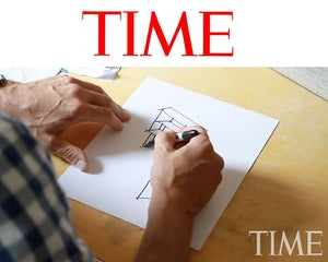 Hands sketching 3D cube with “TIME” text overlay.