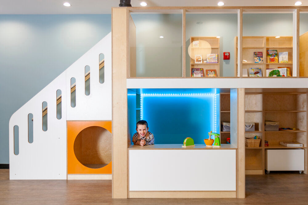 Modern office reception with cat-shaped entrance.