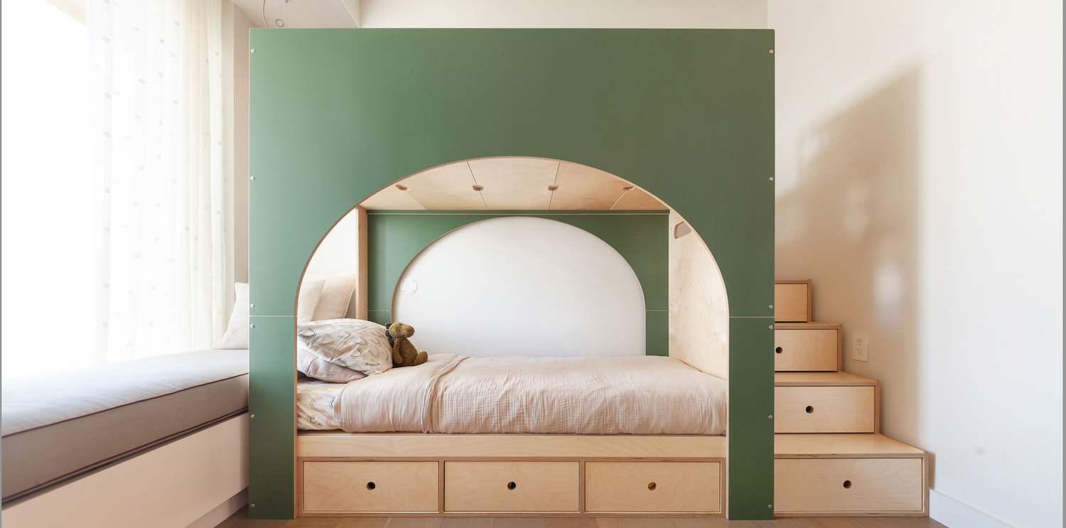 Arched green and birch bed with stairs near white curtain window and white bedding.