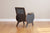 back view of gray armchair with custom graffiti upholstery
