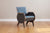 front side view of gray armchair with custom graffiti upholstery