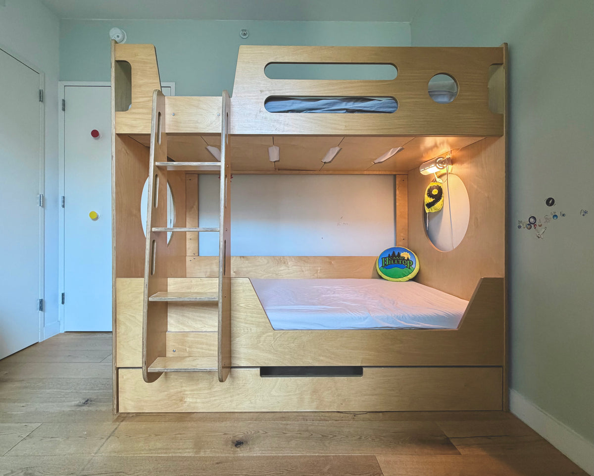 Pre-owned Marino bunk bed in birch, front view with ladder and trundle stored underneath