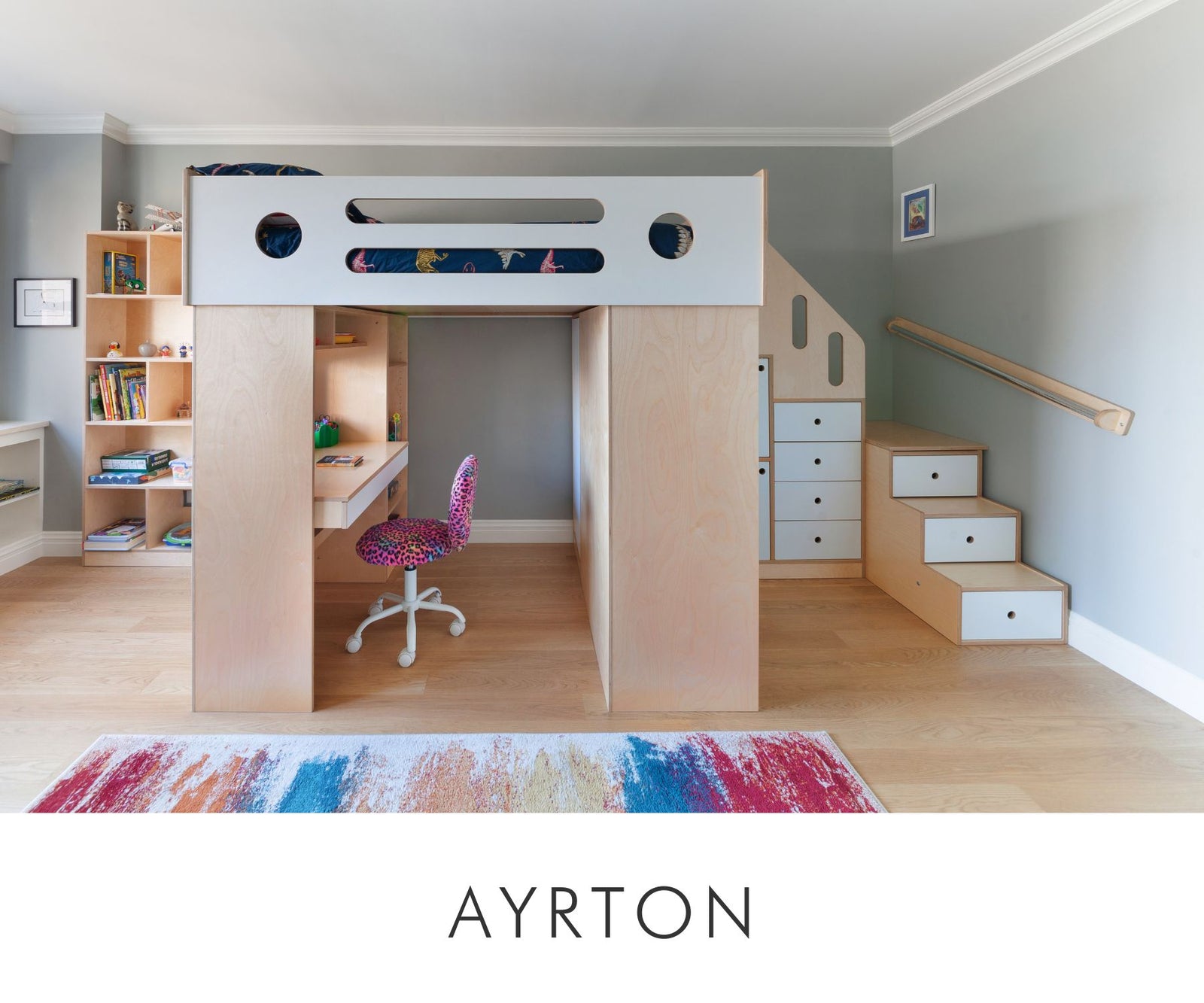 Custom full-size loft bed in birch plywood with white accents, featuring a built-in desk, open shelving, storage drawers, and a staircase with integrated handrail — a multifunctional solution for kids’ rooms.