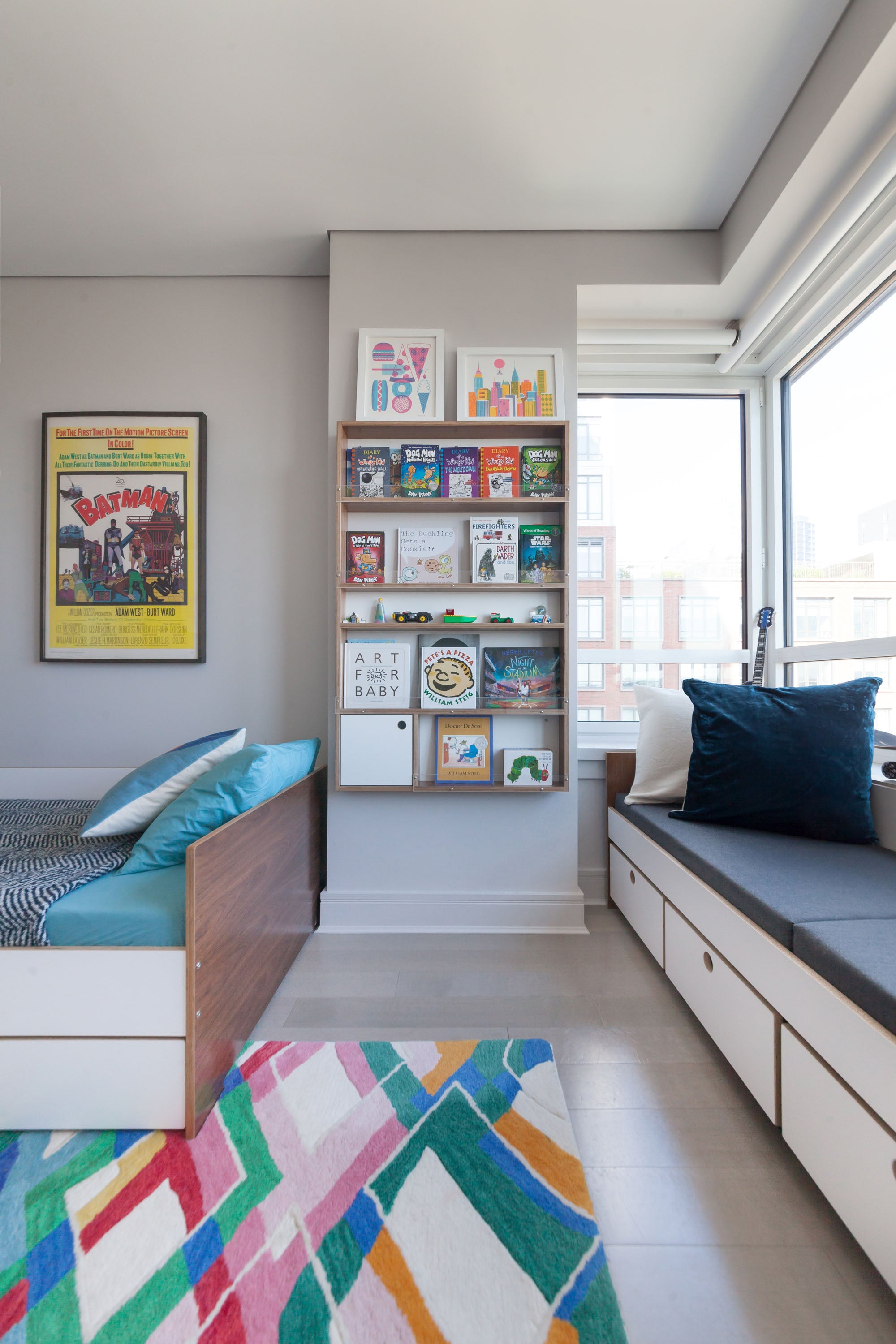 hanging display cabinet, seating, and daybed in walnut finish with white accents