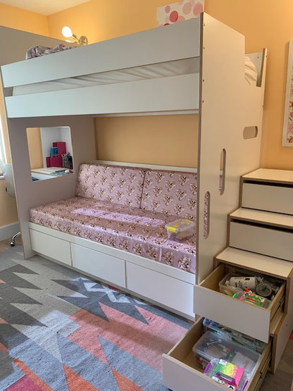 White loft bed over daybed and desk