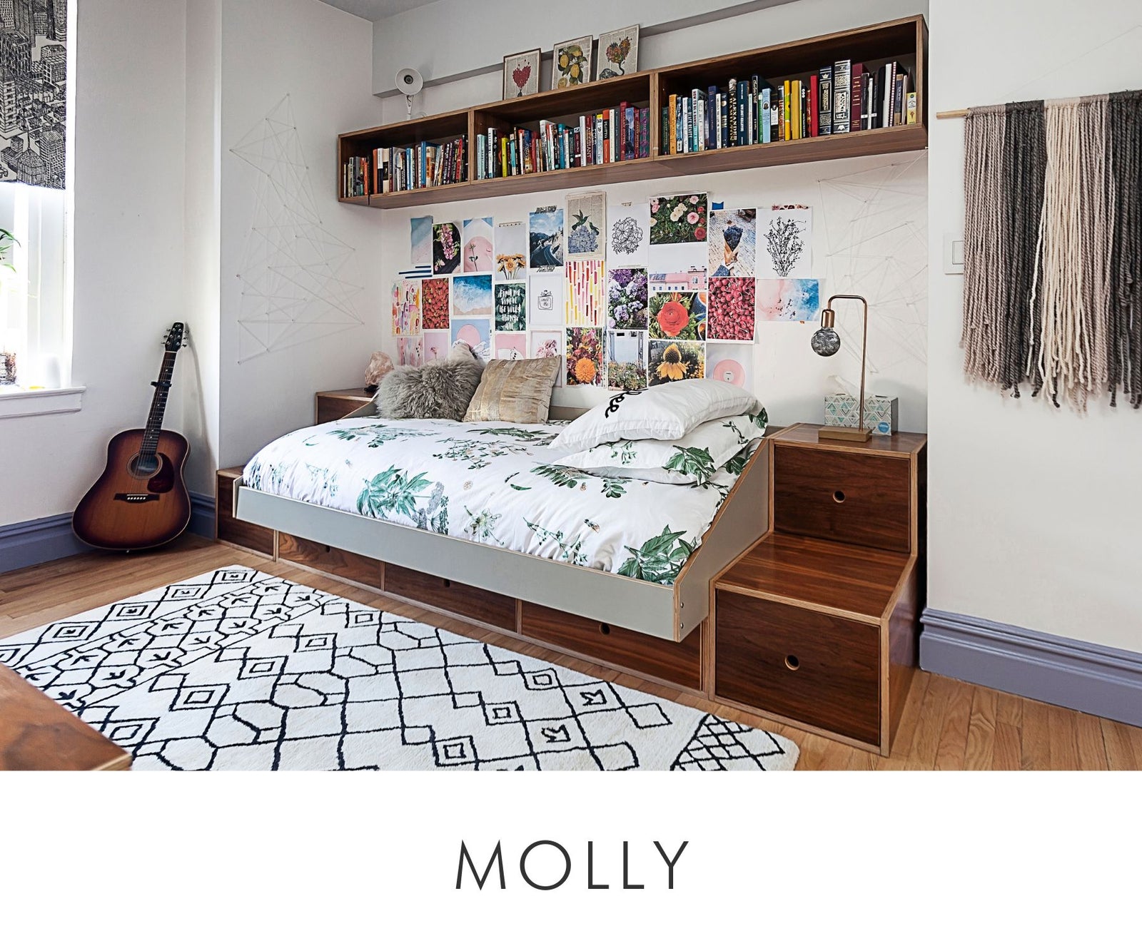 Custom full-size bed with built-in walnut storage drawers and side steps, featuring a gray bed frame and integrated overhead bookshelf — designed for stylish and organized kids’ bedrooms.