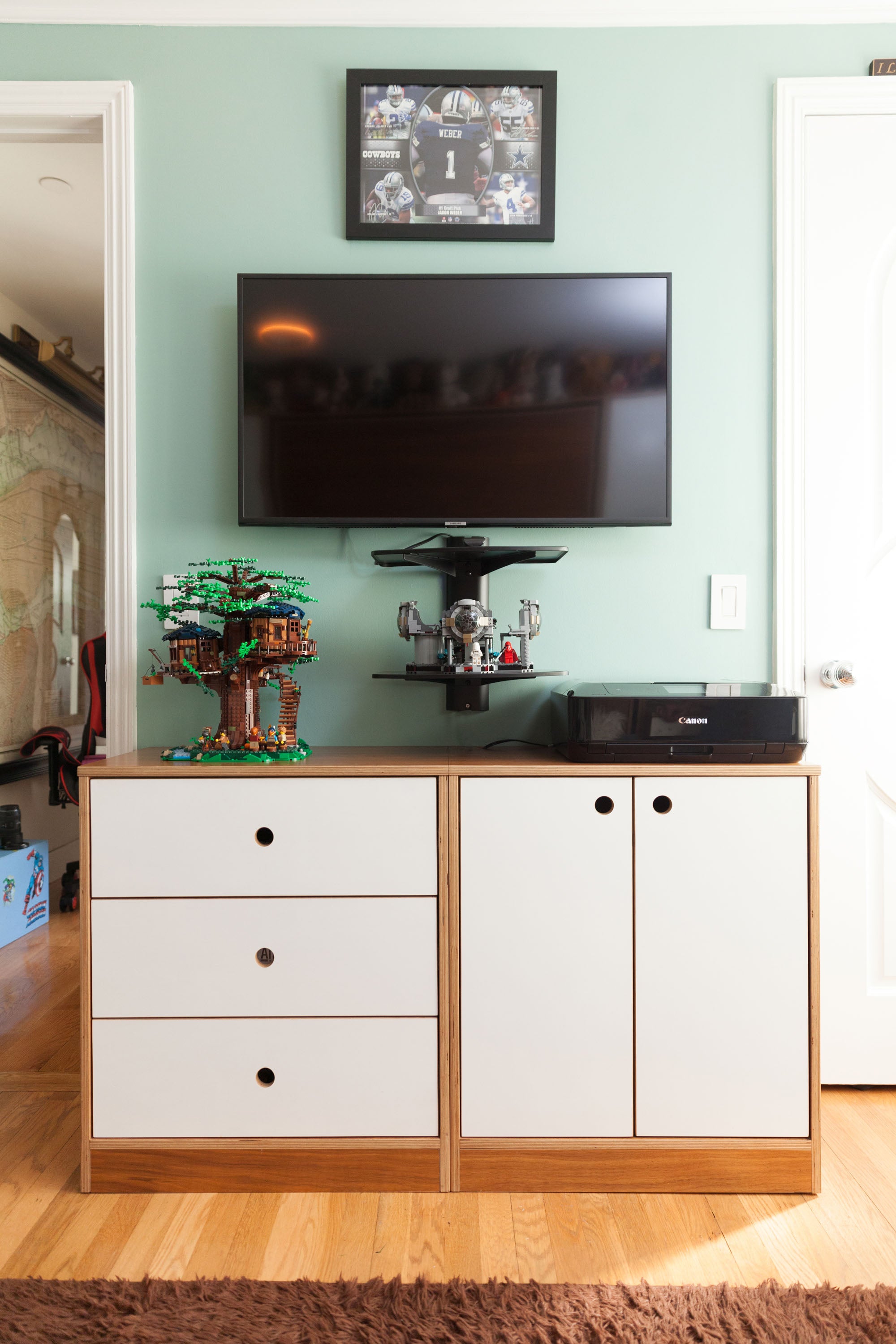 storage units with doors and drawers in walnut finish with white accents