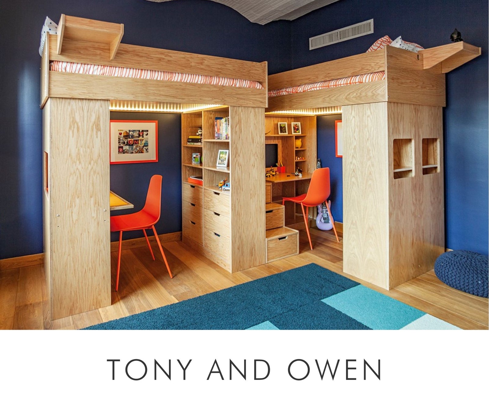Custom twin loft beds in white oak plywood finish with integrated desks, built-in shelving, and a shared central staircase — designed for shared kids' rooms.