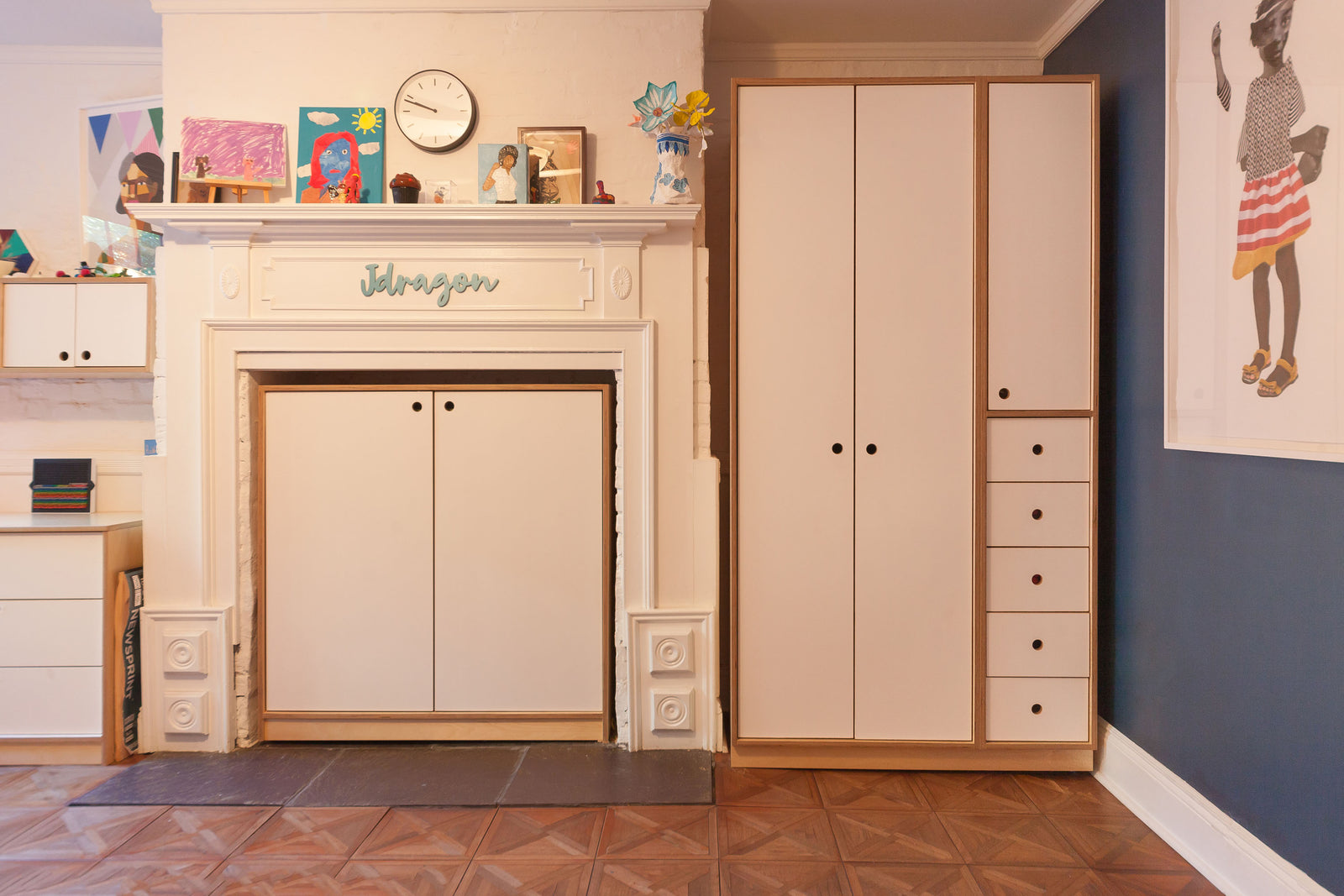 wardrobe with dresser drawers and doors and storage unit with doors in birch finish with white accents
