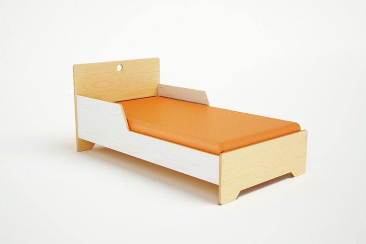 Compact Marino Junior Bed in natural wood, featuring a low-profile design perfect for toddlers transitioning to a big bed.