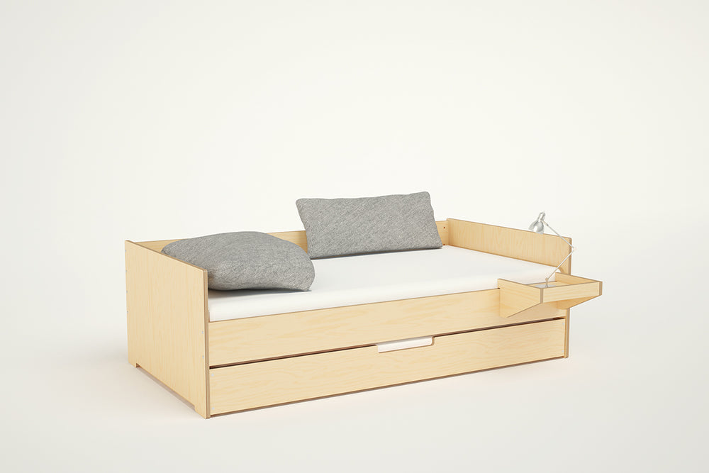 Birch wood twin side simple solid wood bed frame with white bedding, trundle bed, and grey pillows against a white background.
