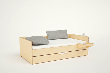 Birch wood twin side simple solid wood bed frame with white bedding, trundle bed, and grey pillows against a white background.